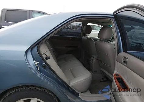 2003 Toyota Camry Xle z USA, uszkodzony, nr VIN 4T1BE32KX3U679911